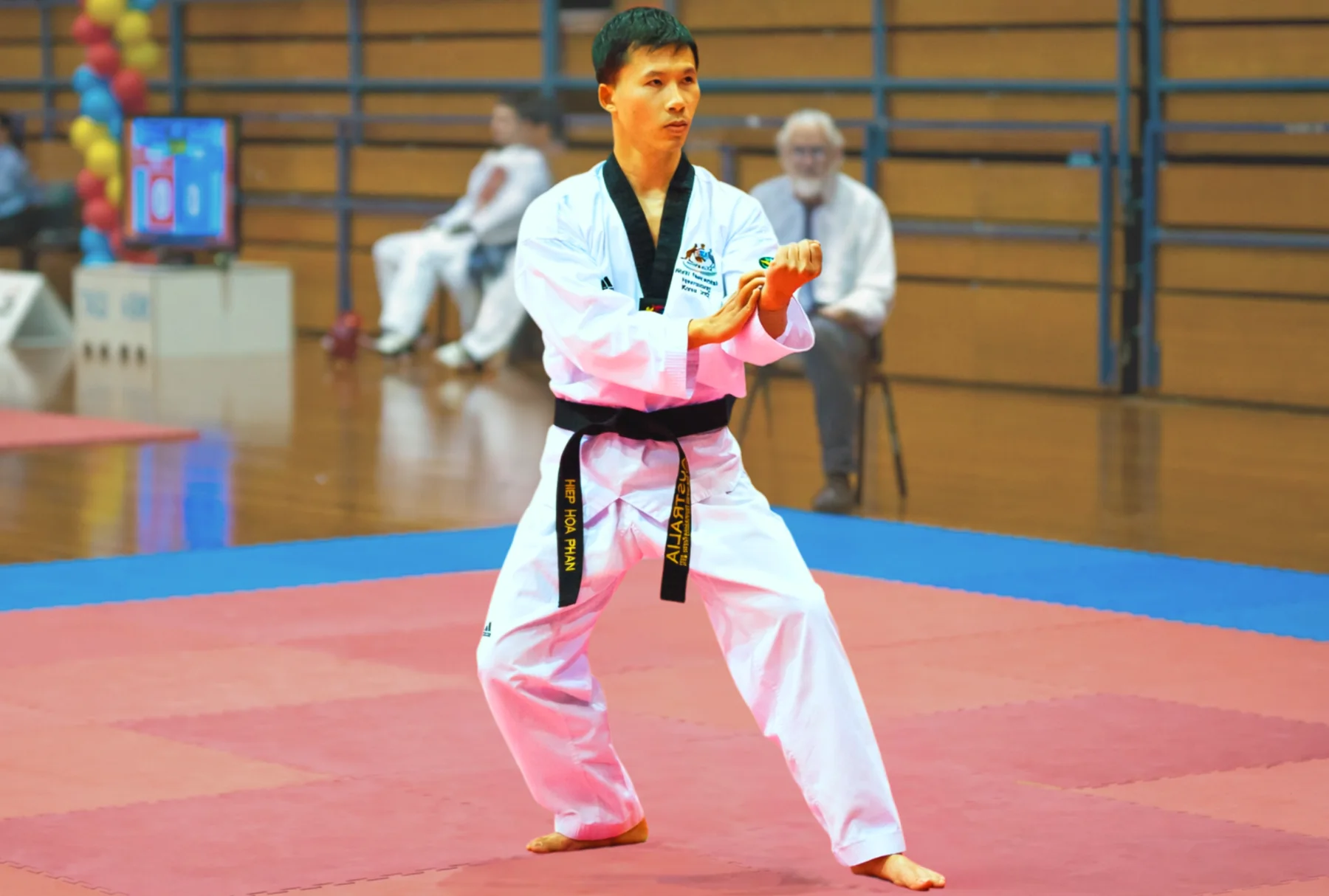 Master Eric demonstrates a Taekwondo pattern